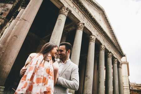 Loving couple in front of the Pantheon in Romeの写真素材