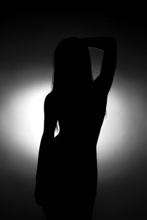Black and white silhouette of cute young girlの写真素材