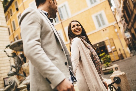 Loving couple walking on the street of Rome, Italyの写真素材