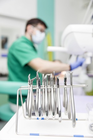 Young woman getting dental treatment in dentist officeの写真素材