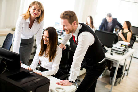 Young businesspeople in modern office