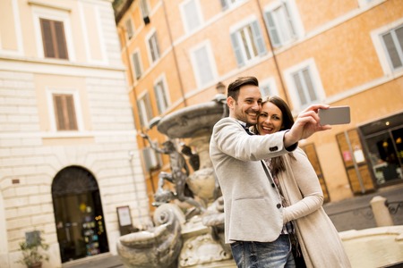 Couple taking selfie in Rome, Italyの写真素材