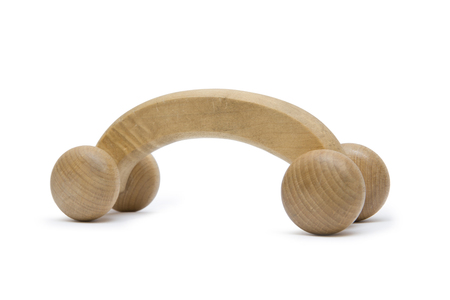 Wooden massager isolated on the whiteの写真素材
