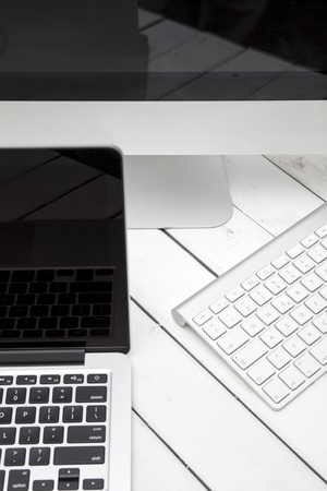 Close up view at computer and laptopの写真素材