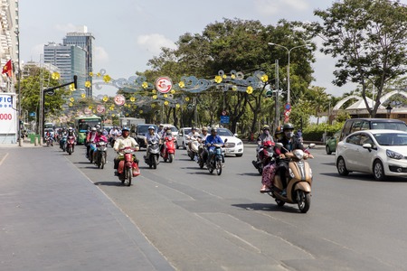HO CHI MINH, VIETNAM - FEBRUARY 22, 2017: Unidentified people on the street of Ho Chi Minh, Vietnam. Ho Chi Minh is the largest city in Vietnam.のeditorial素材