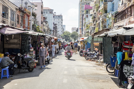 HO CHI MINH, VIETNAM - FEBRUARY 22, 2017: Unidentified people on the street of Ho Chi Minh, Vietnam. Ho Chi Minh is the largest city in Vietnam.のeditorial素材
