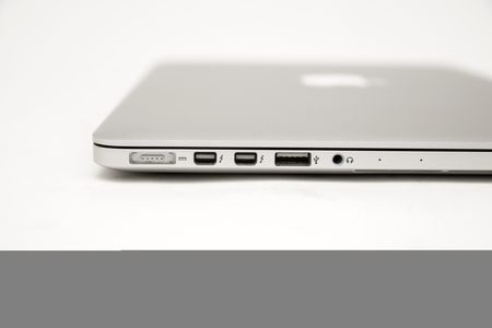 BELGRADE, SERBIA - MARCH 3, 2017: MacBook computer isolated on white. The MacBook is a brand of notebook computers manufactured by Apple Inc.のeditorial素材