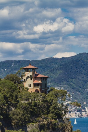 View at buildings above clear water of Mediterranean sea in Portofino, Italyの写真素材