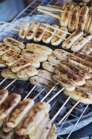 Bananas grilled on the barbecue in Bangkokの写真素材