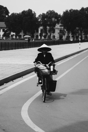 HANOI, VIETNAM - FEBRUARY 3, 2017: Unidentified person on the street of Hanoi, Vietnam. Hanoi is capital of Vietnam and have more than 7,5 million citizens.のeditorial素材