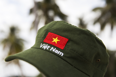View at vietnamese cap on the tropical beachの写真素材