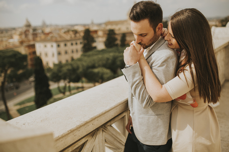 Happy loving couple, man and woman traveling on holidays in Rome, Italyの写真素材