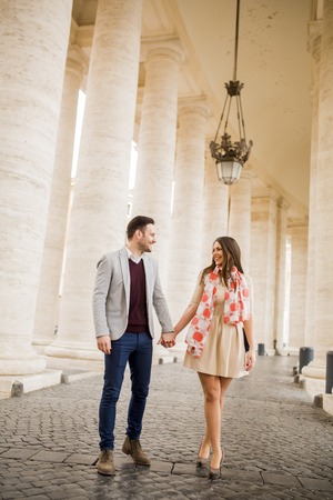 Loving couple at the St. Peter's Square in Vatican, Italyの写真素材