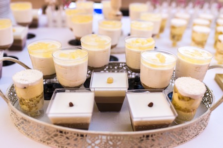 Elegant and luxurious event arrangement with colorful pastriesの写真素材