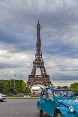 View at vintage car by Eiffel tower in Paris, Franceのeditorial素材