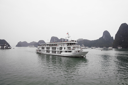 HA LONG, VIETNAM - FEBRUARY 28, 2017: Unidentified people on ship at Ha Long Bay in Vietnam. Ha Long Bay is a UNESCO World Heritage Site and popular travel destination in Vietnam.のeditorial素材