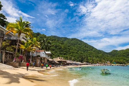 PUERTO VALLARTA, MEXICO - SEPTEMBER 10, 2015: Unindentified people at Playa Las Animas in Mexico. It is a beautiful beach in the southern zone of Puerto Vallarta.のeditorial素材