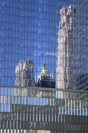 Urban reflection of the modern building in the glass facade