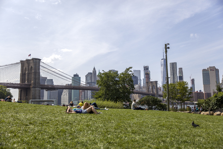 NEW YORK, USA - AUGUST 27, 2017: View at Brooklyn Bridge in New York. It was opened at 1883 and is one of the oldest roadway bridges in the US.のeditorial素材