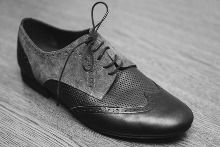 Closeup detail of the male tango shoesの写真素材