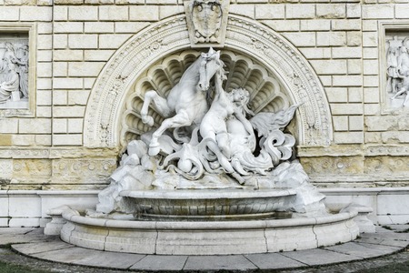 Detail from  Fountain of Nymph and Seahorse inn Bologna, Italy. Statue was made by Diego Sarti in 1896.の写真素材