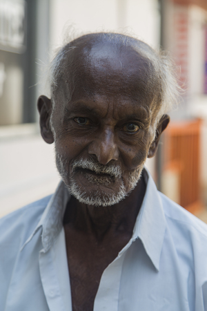 UNAWATUNA, SRI LANKA - JANUARY 23, 2014: Unidentified man on the street of Unawatuna, Sri Lanka.のeditorial素材