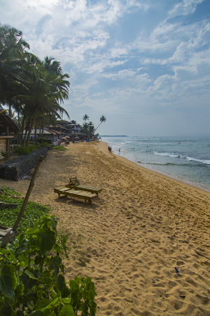 NEGOMBO, SRI LANKA - JANUARY 22, 2014: Unidentified people at Negombo beach at Sri Lanka. Negombo beach is very popular among tourists.のeditorial素材