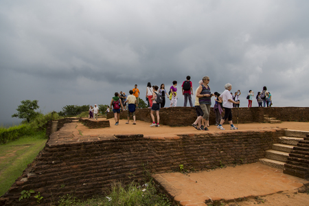 MATALE, SRI LANKA- JANUARY 28, 2014: Unidentified tourists at Sigiriya Rock Fortress at Matale, Sri Lanka. Sigiriya today is a UNESCO listed World Heritage Site and most visited historic site in Sri Lanka.のeditorial素材