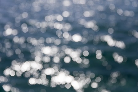 Blurry abstract background of defocused sea surfaceの写真素材