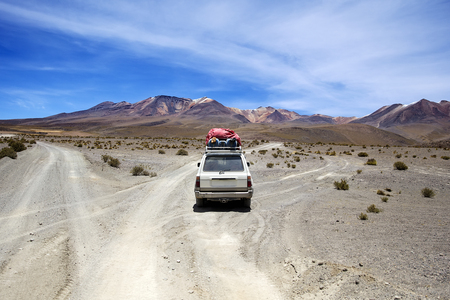 Terrain vehicle in Dali desert at Eduardo Avaroa Andean Fauna National Reserve in Boliviaの写真素材