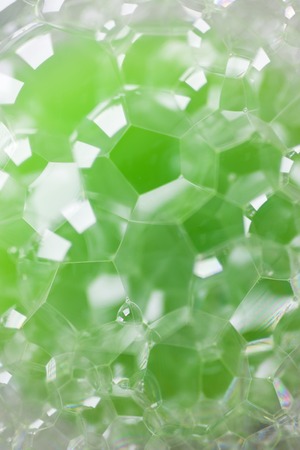 Closeup view at the foam bubbles backdropの写真素材