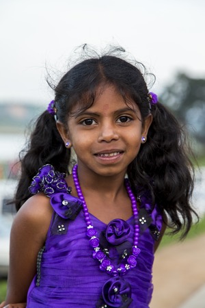 NUWARA ELIYA, SRI LANKA - JANUARY 25, 2014: Unidentified little girl on the street of Nuwara Eliya, Sri Lanka. In Nuwara Eliya live more than 43.000 people, mostly Sinhalese.のeditorial素材