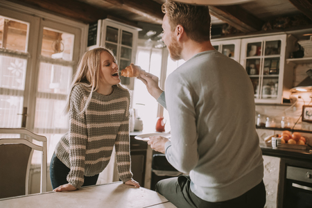 Portrait of loving couple in the kitchenの写真素材