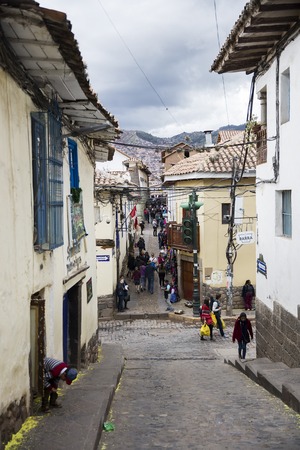 CUSCO, PERU - JANUARY 1, 2018: Unidentified people on the street of Cusco, Peru. the Entire city of Cusco was designated a UNESCO World Heritage Site in 1983.のeditorial素材