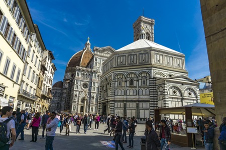 FLORENCE, ITALY - APRIL 6, 2018: Unidentified people by Santa Maria del Fiore cathedral in Florence, Italy. It is the main church of Florence and was opened at 1436.のeditorial素材