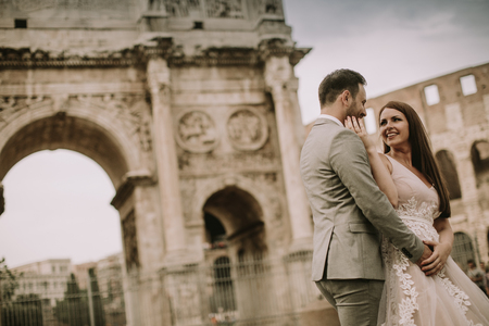 Young wedding couple in love in Rome, Italyの写真素材