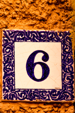 Decorative street number plate from Portofino, Italy. Portofino is one of the most popular resort towns on the Italian Riviera.の写真素材