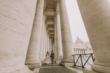 Young wedding couple in Vatican, Rome, Italyの写真素材