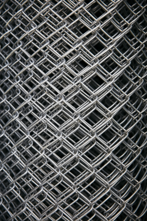 Closeup detail of the metal grid background backdropの写真素材
