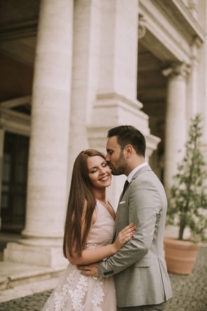 Young wedding couple on Capitoline hill in Rome, Italyの写真素材