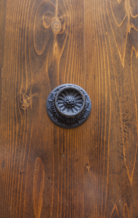 Old wooden door knob from Florence, Italyの写真素材