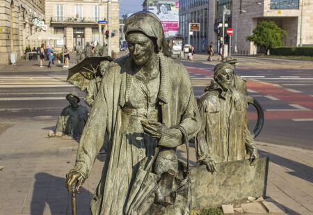 WROCLAW, POLAND - JUNE 11, 2018: The Anonymous Pedestrians sculptures from Wroclaw, Poland. These 14 figures were made by Polish artist Jerry Kalina in 2005.のeditorial素材