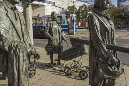 WROCLAW, POLAND - JUNE 11, 2018: The Anonymous Pedestrians sculptures from Wroclaw, Poland. These 14 figures were made by Polish artist Jerry Kalina in 2005.のeditorial素材