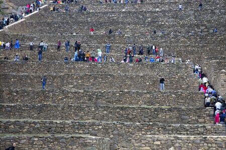 OLLANTAYTAMBO, PERU - DECEMBER 31,2017: Unidentified people at Colossal Sanctuary of Ollantaytambo in Peru. It is Inca archaeological site in southern Peru, 72 km from city of Cusco.のeditorial素材
