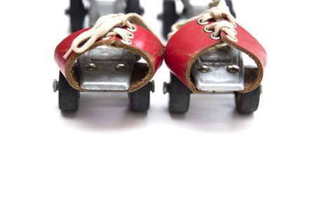 Pair of retro antique skates isolated on the white background