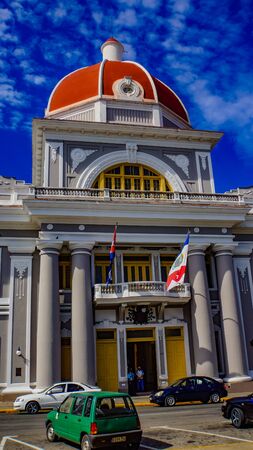 CIENFUEGOS, CUBA - MAY 25, 2014: Unidentified people by Palacio Del Gobierno at Cienfuegos, Cuba....