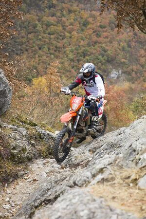 SOKO BANJA, SERBIA - OCTOBER 20, 2018: Unidentified driver at Hard Enduro Race in Soko Banja, Serbia. This moto offroad race took place at October 20-21, 2018.のeditorial素材