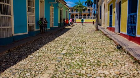 TRINIDAD, CUBA - MAY 25, 2014: Unidentified people on the street of Trinidad, Cuba. Trinidad has been a UNESCO World Heritage site since 1988.のeditorial素材