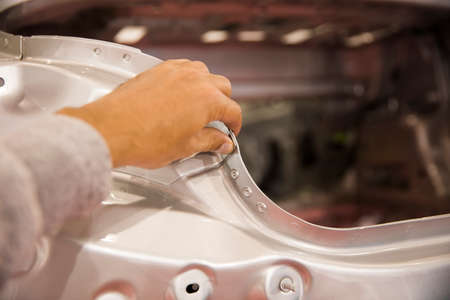 Detail of the sheet metal car productionの写真素材