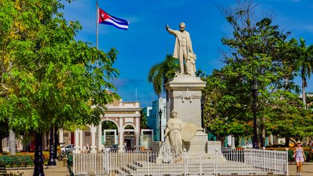 CIENFUEGOS, CUBA - MAY 25, 2014: Unidentified people by statue of Jose Marti in Cienfuegos, Cuba....